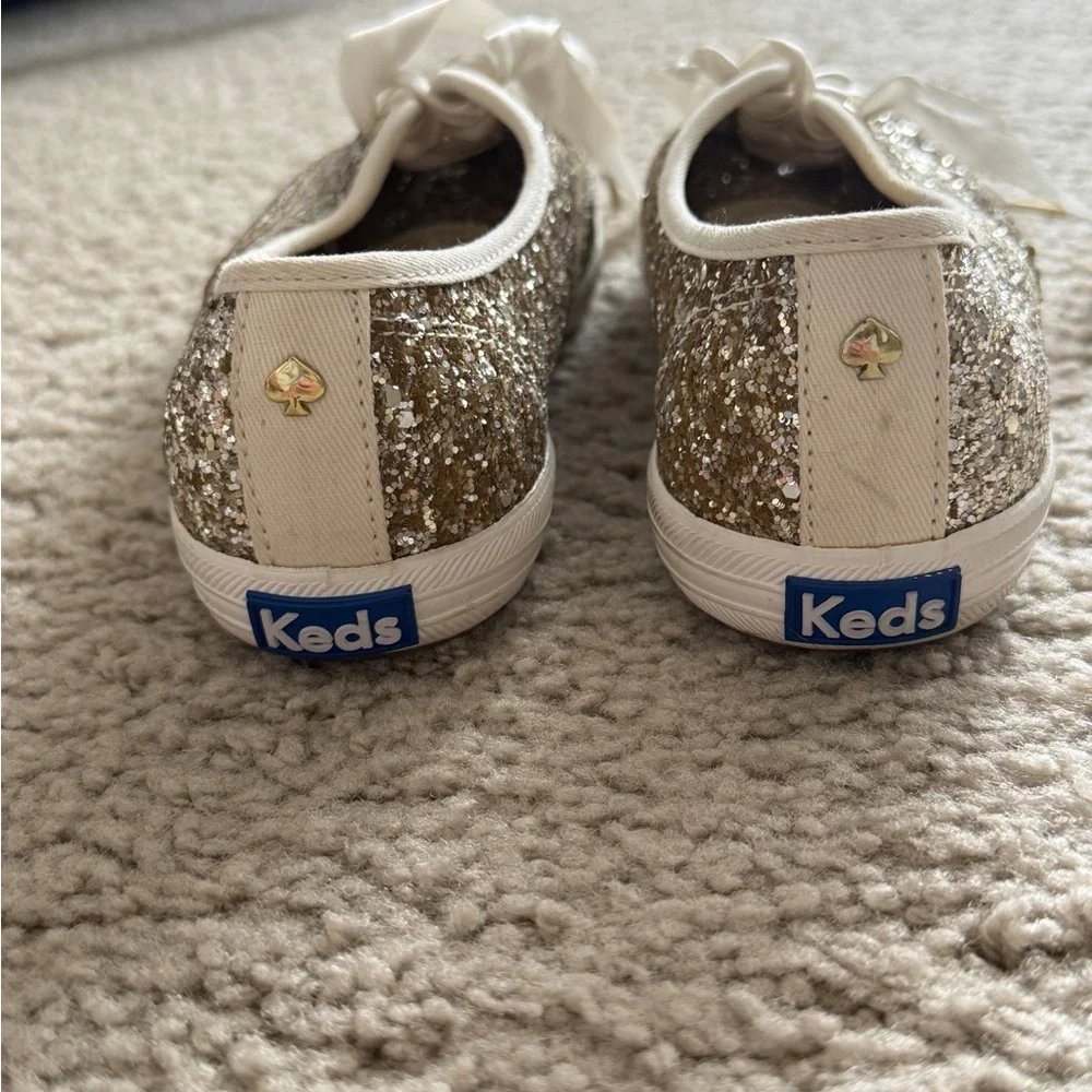 kate spade Glittered Lace-Up Sneakers in Gold and White